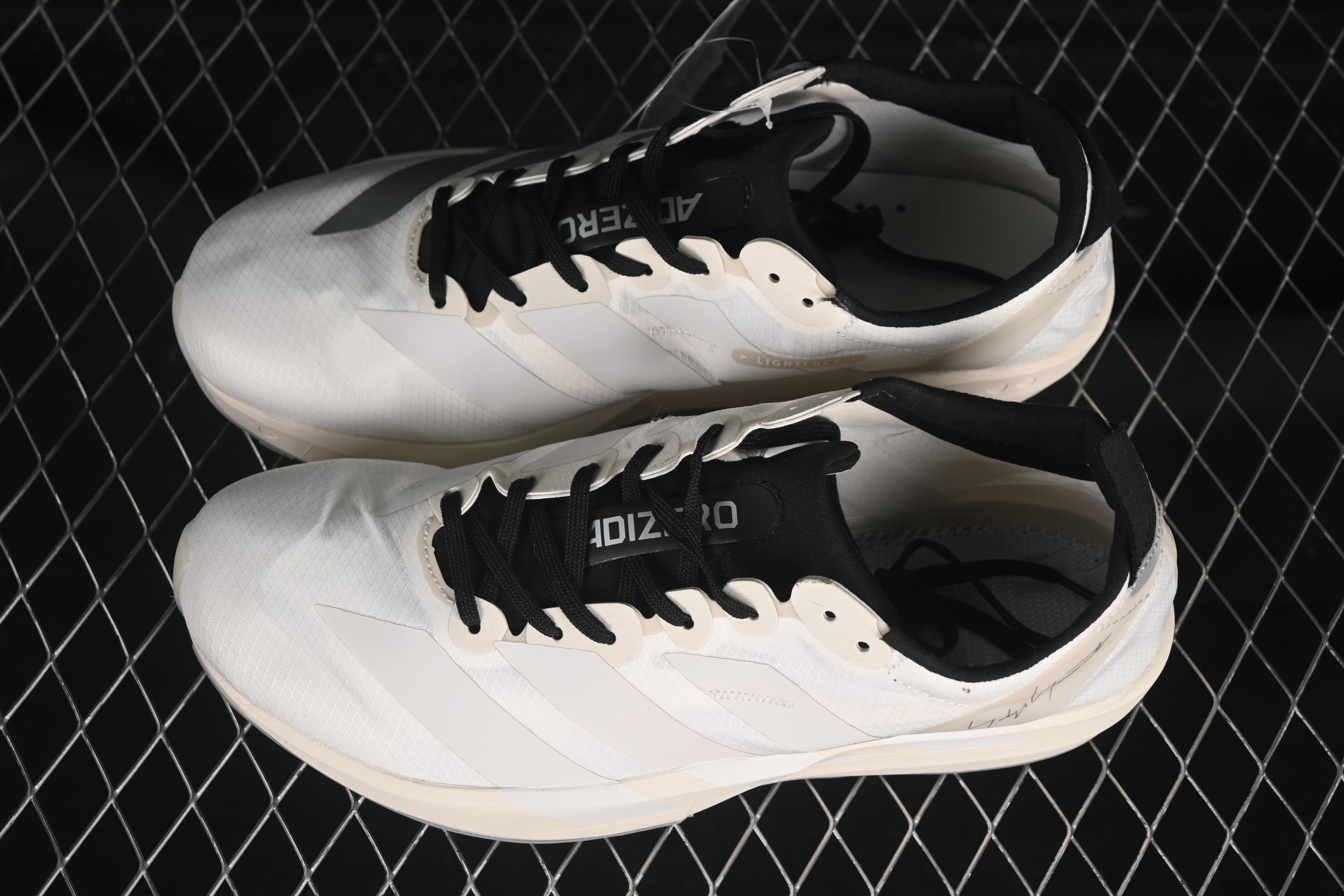 Adidas Adios 9 Running Shoes with Lightweight Upper and Cushioning - JS3152
