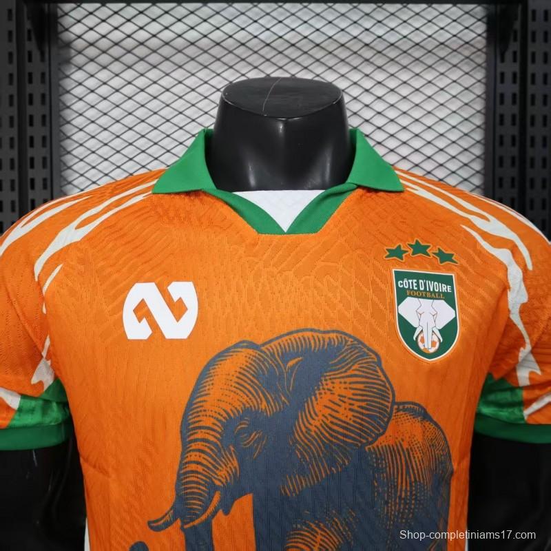 Player Version 2025 Ivory Coast Orange with Elephant Graphic and Green Accents Jersey